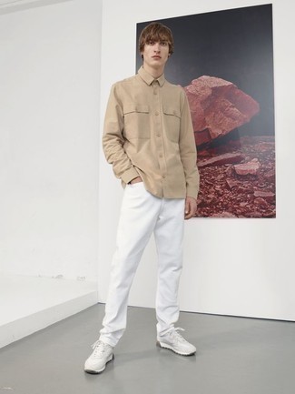 White Athletic Shoes Outfits For Men: This pairing of a tan long sleeve shirt and white jeans is indisputable proof that a safe off-duty look can still look really interesting. White athletic shoes are guaranteed to add a dose of stylish nonchalance to your ensemble.