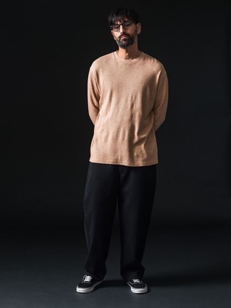Tan Long Sleeve T-Shirt Outfits For Men: Pairing a tan long sleeve t-shirt with black chinos is an on-point option for a cool and relaxed getup. If not sure about what to wear on the shoe front, go with black and white canvas low top sneakers.