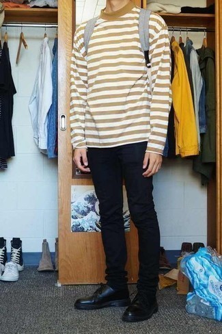 Tan Horizontal Striped Long Sleeve T-Shirt Outfits For Men: This casual combination of a tan horizontal striped long sleeve t-shirt and black chinos will draw attention wherever you go. To bring an extra dimension to your ensemble, add black leather derby shoes to this ensemble.