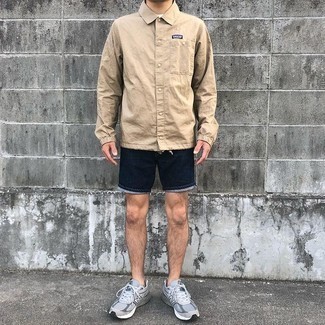 Navy Shorts Outfits For Men: This combo of a tan nylon shirt jacket and navy shorts looks pulled together and immediately makes any man look seriously stylish. Complete your ensemble with a pair of grey athletic shoes to avoid looking overdressed.