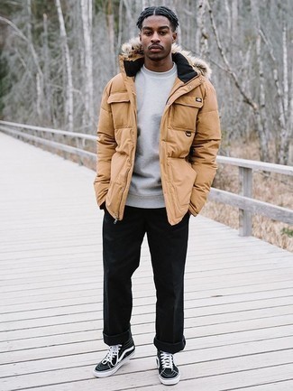 Beige Puffer Jacket Outfits For Men: This combination of a beige puffer jacket and black chinos is certainly impactful, but it's also extremely easy to wear. For a modern on and off-duty mix, introduce black and white canvas high top sneakers to the mix.