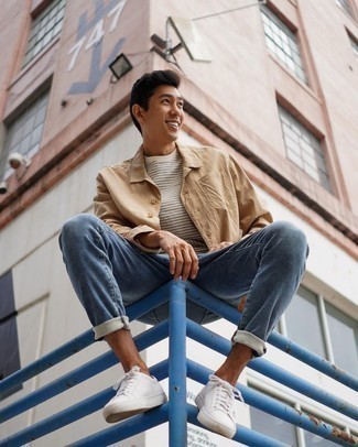 Tan Shirt Jacket Outfits For Men: Try teaming a tan shirt jacket with blue jeans to create a truly dapper and current casual outfit. Wondering how to finish off? Complement this ensemble with a pair of white canvas low top sneakers for a more laid-back spin.