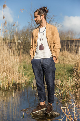Navy Chinos Outfits: The ideal foundation for casually sleek menswear style? A tan shirt jacket with navy chinos. Add dark brown suede boat shoes to the mix to make a classic ensemble feel suddenly edgier.