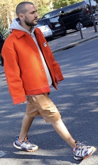 Men's Multi colored Athletic Shoes, Tan Leather Shorts, Grey Hoodie, Orange Shirt Jacket