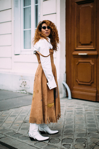 Tan Suede Midi Dress Outfits In Their 30s: When the dress code calls for a polished yet knockout ensemble, rock a tan suede midi dress with a white dress shirt. Wondering how to round off? Complete this look with white leather cowboy boots to shake things up.