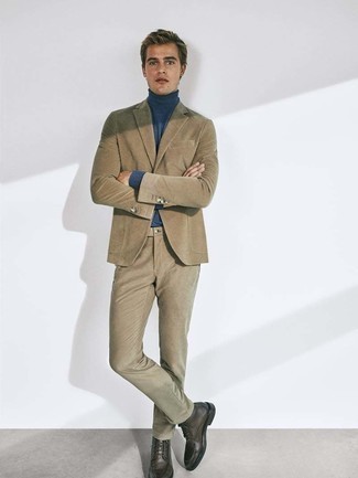 Tan Suit Outfits: Go all out in a tan suit and a navy turtleneck. If you need to effortlessly dial down your ensemble with one single piece, complement this ensemble with a pair of dark brown leather casual boots.