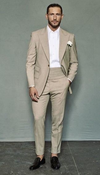 Tan Suit Outfits: You're looking at the indisputable proof that a tan suit and a white dress shirt look awesome when you pair them in a refined look for today's man. Finishing with black leather loafers is a surefire way to infuse a dash of stylish nonchalance into this outfit.