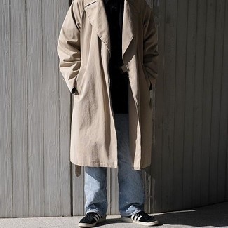 Trenchcoat Outfits For Men: The go-to for a knockout and on-trend look? A trenchcoat with light blue jeans. Make this ensemble more functional by finishing with a pair of black and white suede low top sneakers.