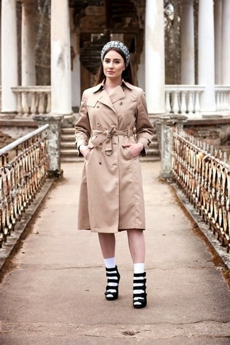 Tan Trenchcoat Outfits For Women: As you can see here, looking stylish doesn't require that much effort. Consider wearing a tan trenchcoat and you'll look seriously stylish. Black suede heeled sandals are a wonderful pick to round off your getup.
