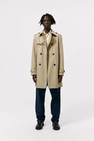 Tan Trenchcoat Outfits For Men: A tan trenchcoat and navy chinos matched together are the ideal look for those who prefer sophisticated combinations. Complement this outfit with a pair of black leather chelsea boots to instantly shake up the ensemble.