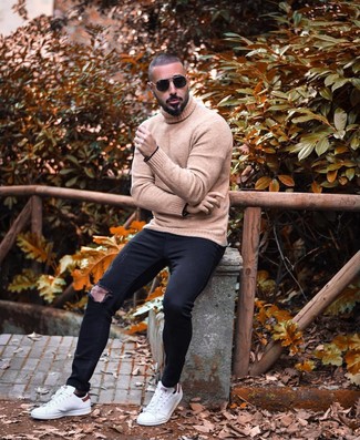 Beige Wool Turtleneck Outfits For Men: If you love city casual getups, why not wear this combo of a beige wool turtleneck and black ripped skinny jeans? If you want to immediately polish up your outfit with one single item, why not introduce white leather low top sneakers to the equation?