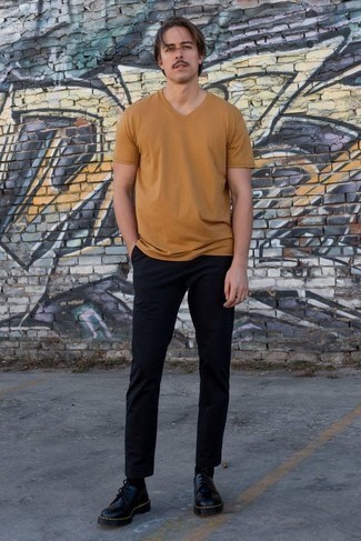 Beige V-neck T-shirt Outfits For Men: Why not consider wearing a beige v-neck t-shirt and black chinos? Both of these pieces are very functional and will look amazing worn together. Not sure how to round off your ensemble? Wear black leather derby shoes to bump up the classy factor.