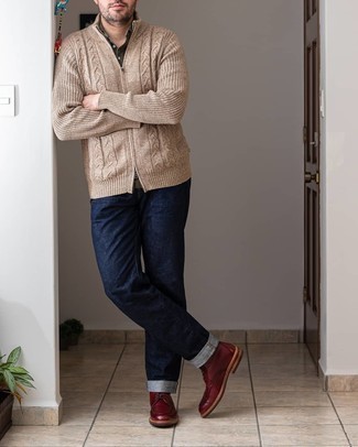 Red Leather Casual Boots Outfits For Men: Effortlessly blurring the line between cool and casual, this combo of a tan knit zip sweater and navy jeans can easily become your go-to. Feeling brave today? Smarten up your ensemble with a pair of red leather casual boots.