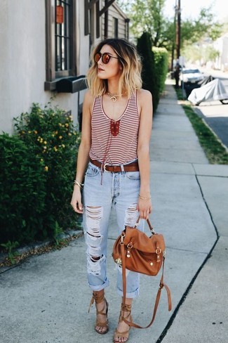 Brown Leather Satchel Bag Outfits: A red horizontal striped tank and a brown leather satchel bag are a good pairing to be utilised on off-duty days. Complement this outfit with tan suede heeled sandals for a sense of class.
