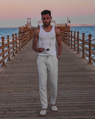 1200+ Casual Hot Weather Outfits For Men: Why not try pairing a white tank with white chinos? Both of these pieces are super practical and look nice when paired together. Serve a little mix-and-match magic by wearing a pair of white vertical striped canvas espadrilles.