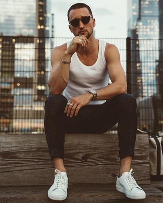 White Tank Outfits For Men: A white tank and charcoal check chinos are great menswear items to add to your off-duty wardrobe. A pair of white canvas low top sneakers easily boosts the classy factor of your outfit.