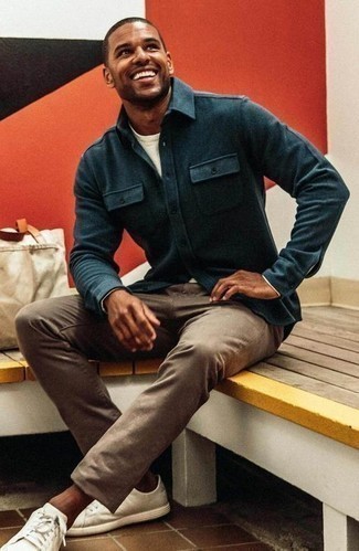 Teal Flannel Long Sleeve Shirt Outfits For Men: Combining a teal flannel long sleeve shirt with brown chinos is an on-point choice for a casually cool outfit. For something more on the daring side to finish off your ensemble, add a pair of white canvas low top sneakers to the equation.