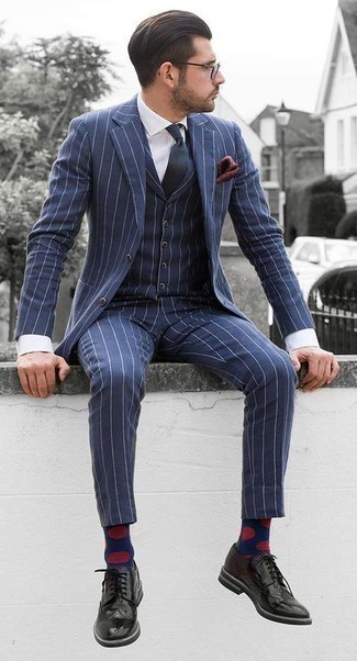 Navy Vertical Striped Three Piece Suit Outfits: Consider pairing a navy vertical striped three piece suit with a white dress shirt - this look is bound to make an entrance. If you want to effortlessly play down this outfit with a pair of shoes, introduce black leather brogues to this look.