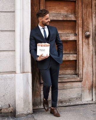 Brown Leather Brogues Outfits: We're loving the way this combo of a navy three piece suit and a white dress shirt instantly makes men look stylish and refined. Rounding off with a pair of brown leather brogues is a guaranteed way to introduce a more casual finish to your look.