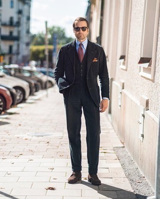Dark Green Three Piece Suit Outfits: Teaming a dark green three piece suit and a light blue dress shirt is a fail-safe way to breathe elegance into your current styling arsenal. Add dark brown suede casual boots to the mix to immediately rev up the street cred of this look.