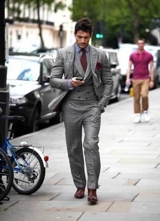 White and Navy Check Dress Shirt Outfits For Men: Marrying a white and navy check dress shirt with a grey plaid three piece suit is a great pick for a sharp and classy getup. The whole ensemble comes together brilliantly if you complete this look with burgundy leather chelsea boots.