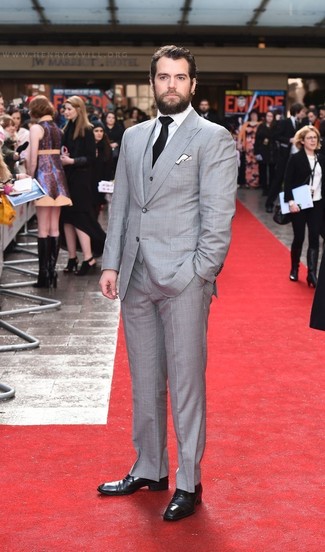 Henry Cavill wearing Grey Three Piece Suit, White Dress Shirt, Black Leather Derby Shoes, Black Tie