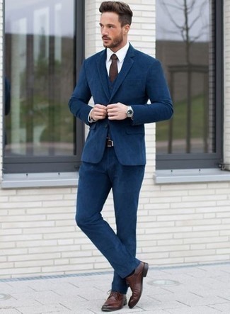 Three Piece Suit Outfits: This is solid proof that a three piece suit and a white dress shirt look amazing when married together in an elegant ensemble for a modern gentleman. Here's how to add a more laid-back spin to this ensemble: burgundy leather derby shoes.