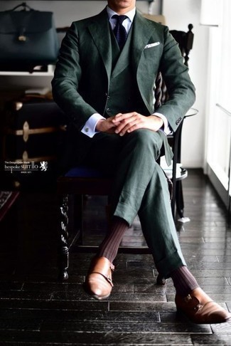Dark Green Suit Outfits: Combining a dark green suit with a white dress shirt is a wonderful pick for a sharp and refined look. For something more on the off-duty side to finish this look, complement your look with a pair of tobacco leather double monks.