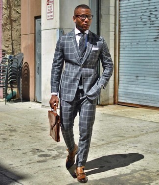 Grey Three Piece Suit Outfits: You're looking at the undeniable proof that a grey three piece suit and a white dress shirt look awesome when paired together in a classy ensemble for a modern dandy. And if you need to immediately dial down this outfit with a pair of shoes, grab a pair of brown leather double monks.