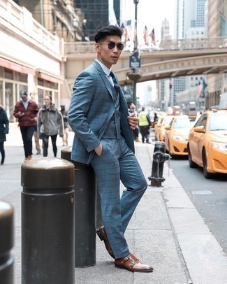 Blue Check Three Piece Suit Outfits: Dress in a blue check three piece suit and a white dress shirt to look like a real dandy. Serve a little mix-and-match magic by rounding off with brown leather double monks.
