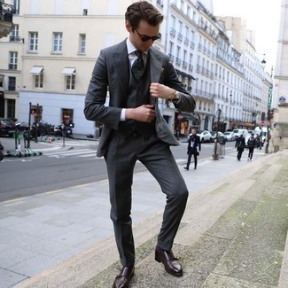 Light Violet Socks Outfits For Men: A charcoal three piece suit looks especially good when worn with light violet socks. Don't know how to round off this outfit? Rock dark brown leather double monks to elevate it.