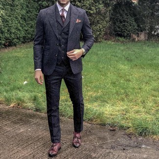 Orange Watch Outfits For Men: A black vertical striped three piece suit and an orange watch are the ideal way to inject effortless cool into your current casual fashion mix. Burgundy fringe leather loafers are a guaranteed way to inject a hint of polish into this outfit.