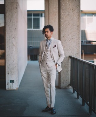 Beige Three Piece Suit Outfits: A beige three piece suit looks so polished when paired with a white and navy vertical striped dress shirt in a modern man's combo. For a more casual finish, throw dark brown leather loafers in the mix.
