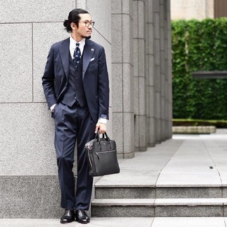 Briefcase Outfits: This pairing of a navy vertical striped three piece suit and a briefcase is definitive proof that a safe casual getup doesn't have to be boring. A pair of black leather oxford shoes will bring an elegant twist to your ensemble.