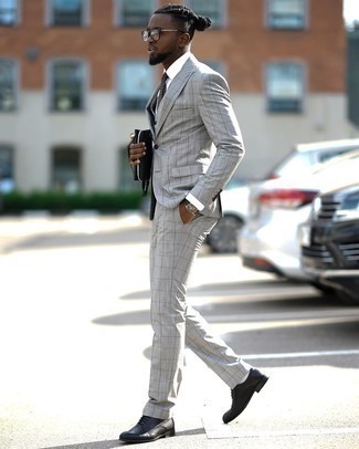 Grey Check Three Piece Suit Outfits: When it comes to high-octane dapper style, this pairing of a grey check three piece suit and a white dress shirt doesn't disappoint. Introduce a pair of black leather oxford shoes to the mix et voila, this ensemble is complete.