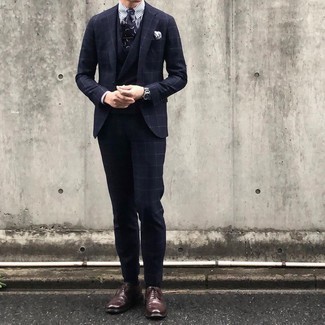 Grey Pocket Square Outfits: This combination of a navy check three piece suit and a grey pocket square is undeniable proof that a pared down casual outfit doesn't have to be boring. Complement your outfit with a pair of dark brown leather oxford shoes to completely change up the look.