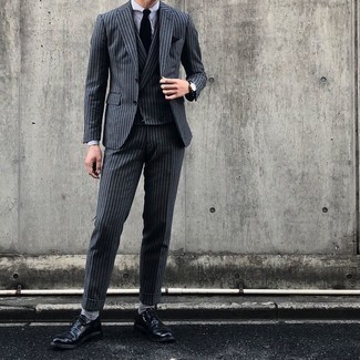Grey Three Piece Suit Outfits: Loving the way this combo of a grey three piece suit and a white dress shirt immediately makes men look refined and stylish. Grab a pair of black leather oxford shoes and ta-da: the look is complete.
