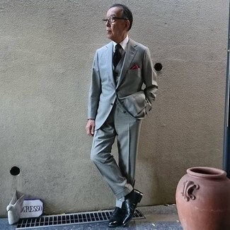 Grey Three Piece Suit Outfits: Hard proof that a grey three piece suit and a white dress shirt look awesome when teamed together in an elegant ensemble for a modern guy. If you're on the fence about how to round off, add black leather oxford shoes to the mix.