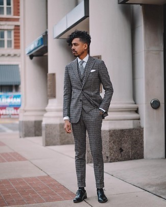 Grey Tie Outfits For Men: To look smooth and classic, make a charcoal gingham wool three piece suit and a grey tie your outfit choice. A trendy pair of black leather oxford shoes is an effective way to give a hint of stylish nonchalance to this ensemble.