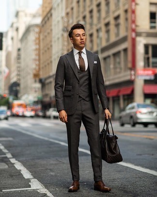 Three Piece Suit Outfits: One of the smartest ways to style out such a timeless menswear piece as a three piece suit is to pair it with a white dress shirt. Complete your ensemble with dark brown leather oxford shoes et voila, the look is complete.