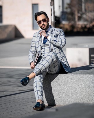 Grey Check Three Piece Suit Outfits: A grey check three piece suit and a white dress shirt are a savvy pairing that will earn you a ton of attention. Let your styling chops truly shine by completing this ensemble with black leather tassel loafers.