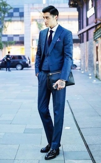 Navy Three Piece Suit Outfits: Choose a navy three piece suit and a white dress shirt for manly sophistication with a modern finish. To bring a hint of stylish nonchalance to your outfit, introduce a pair of black leather tassel loafers to the equation.