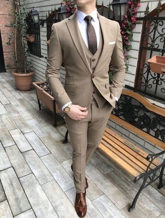 Gold Watch Outfits For Men: Effortlessly blurring the line between cool and relaxed, this pairing of a tan three piece suit and a gold watch will easily become your favorite. Why not take a classic approach with shoes and introduce a pair of brown leather tassel loafers to your look?