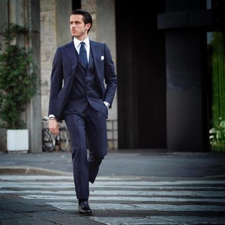 Navy Vertical Striped Three Piece Suit Outfits: Marrying a navy vertical striped three piece suit with a white dress shirt is a nice pick for a dapper and refined look. A pair of black leather tassel loafers rounds off this outfit quite well.