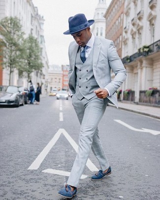Navy Wool Hat Outfits For Men: For an off-duty look, wear a grey three piece suit with a navy wool hat — these two pieces play perfectly well together. Here's how to dress it up: blue suede tassel loafers.