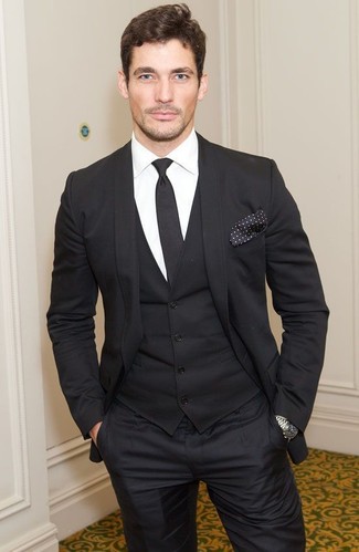 This classy pairing of a black three piece suit and a white dress shirt is a common choice among the dapper gentlemen.