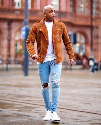 Tobacco Suede Biker Jacket Outfits For Men: Dress in a tobacco suede biker jacket and light blue ripped skinny jeans for relaxed dressing with an urban take. A pair of white canvas low top sneakers immediately turns up the fashion factor of any outfit.