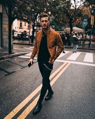 Tobacco Suede Bomber Jacket Outfits For Men: This laid-back combination of a tobacco suede bomber jacket and black skinny jeans is extremely easy to throw together in next to no time, helping you look seriously stylish and prepared for anything without spending a ton of time going through your closet. If you feel like dressing up a bit now, rock a pair of black leather chelsea boots.