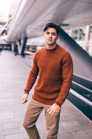 Tobacco Crew-neck Sweater Outfits For Men: Go for a pared down but casually dapper choice by putting together a tobacco crew-neck sweater and khaki chinos.