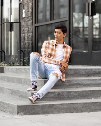 Tobacco Plaid Long Sleeve Shirt Outfits For Men: Opt for a tobacco plaid long sleeve shirt and light blue ripped jeans to feel confident and look stylish. The whole ensemble comes together if you add black and white canvas high top sneakers to the equation.